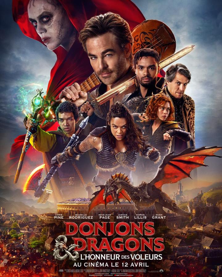 Affiche française de Donjons et Dragons : L’Honneur des voleurs, avec le groupe d’aventuriers et un dragon rouge.